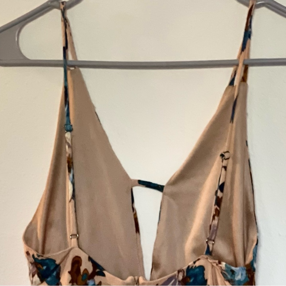 Coveted Clothing Woman’s Floral Romper - Picture 5 of 11